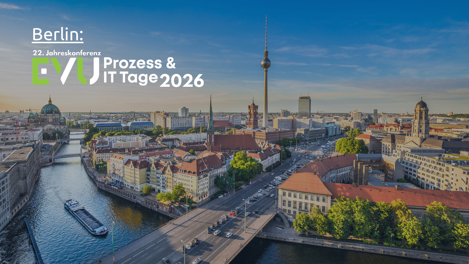 Luftaufnahme von Berlin mit Fluss und Stadtansicht, Veranstaltungshinweis für die IT-Tage 2026.